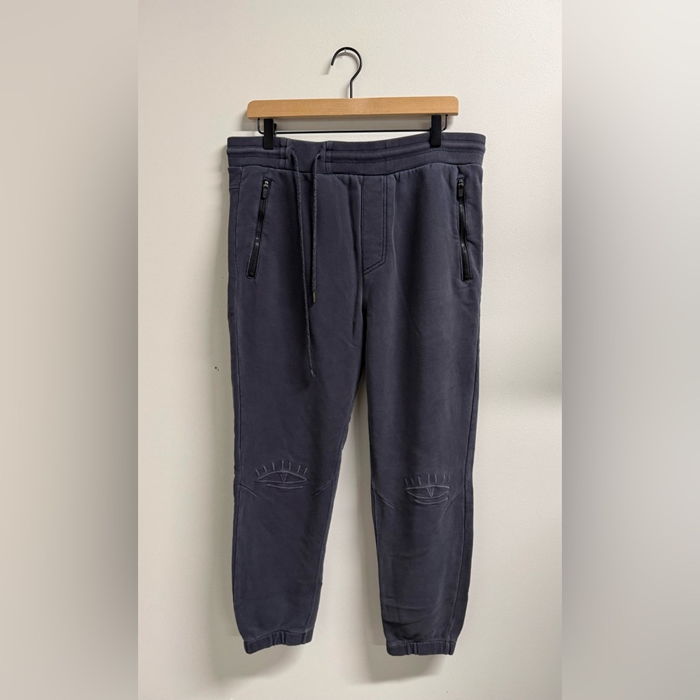 Hurley x Stink collab joggers with embroidered  eye logo on knees